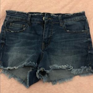 Jean shorts with butterfly patches on the pockets